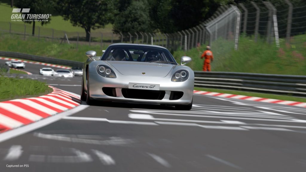 A Porsche drives around the Nurburgring