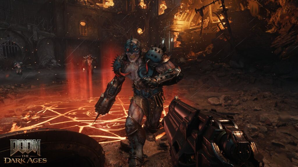 The Slayer walks towards a demon with a nasty looking weapon in hand