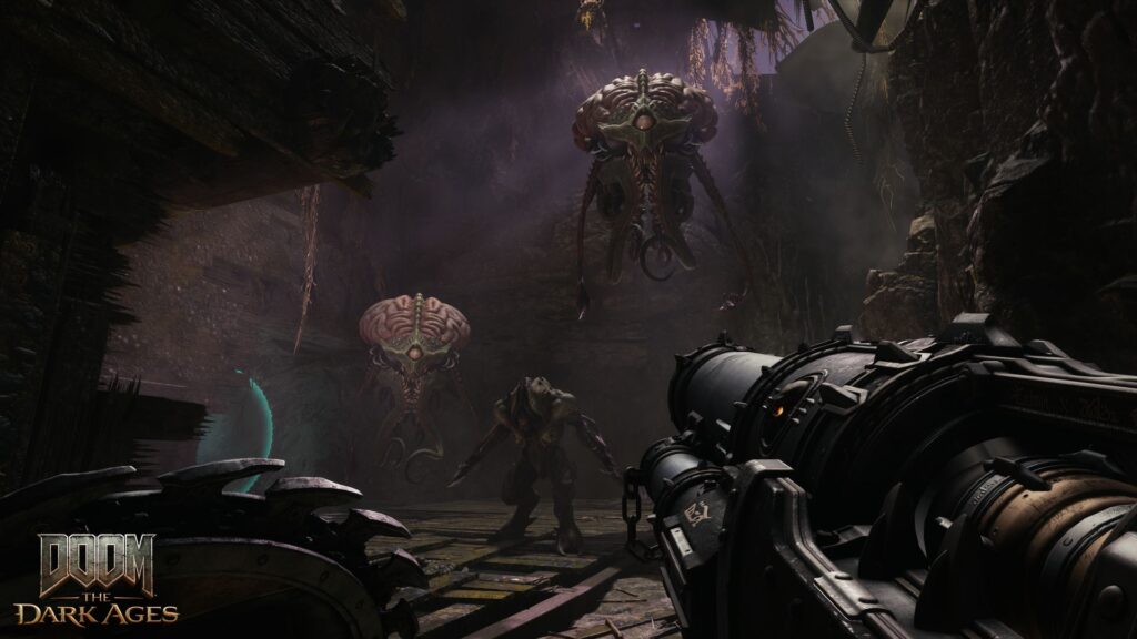 The Slayer walks towards a demon with a nasty looking weapon in hand